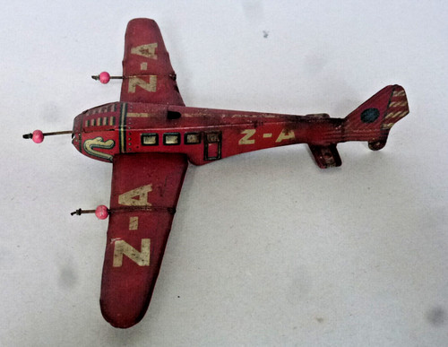 Kleines flugzeug aus blech - aus,